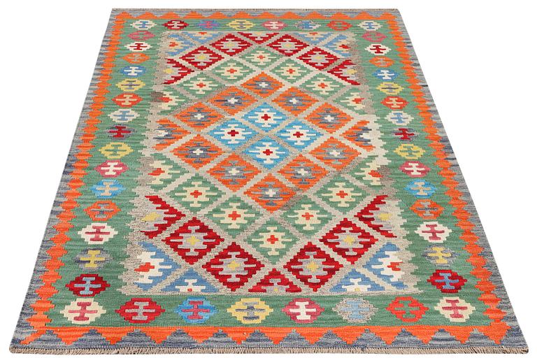 A Kilim rug, c. 243 x 175 cm.