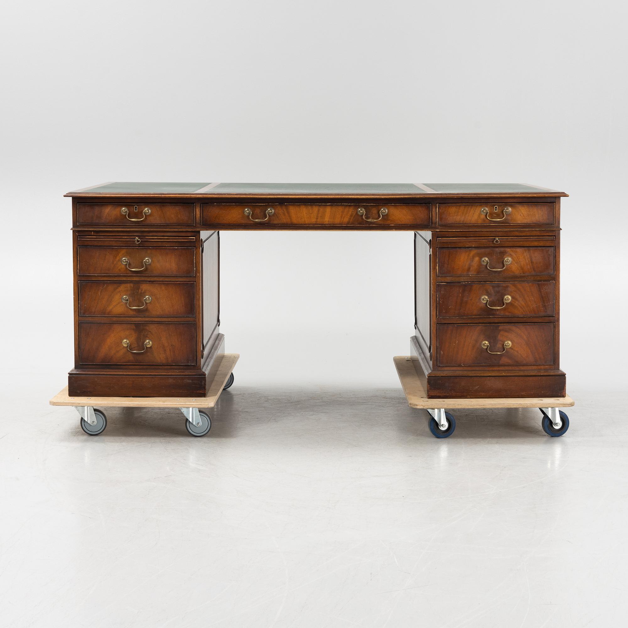 A 20th century Bevan Funnell Ltd Reprodux desk, England.