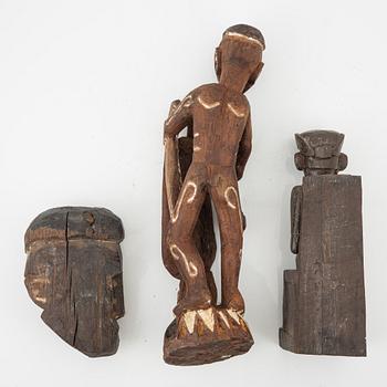 A set of three wooden Asmat sculptures, Indonesia, Jakarta, 20th Century.