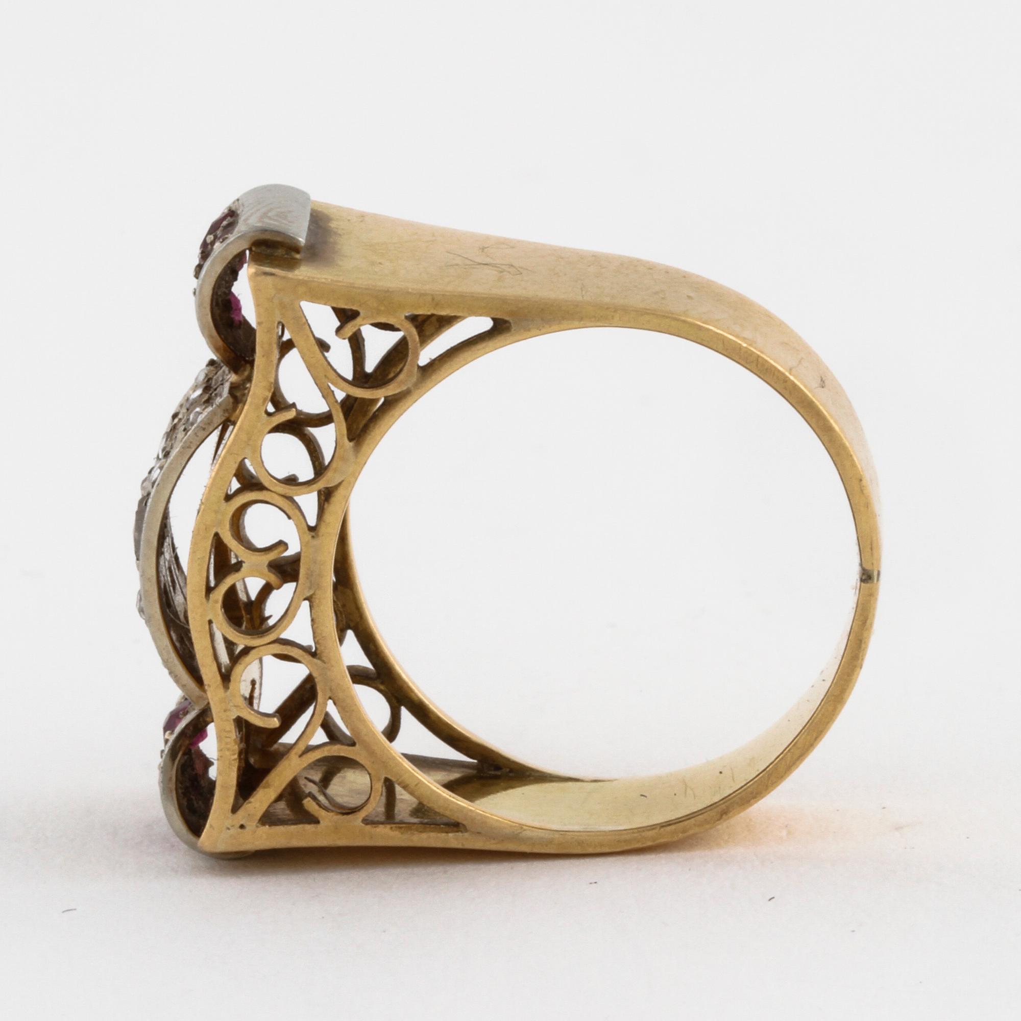 A ruby and rose cut diamond ring.