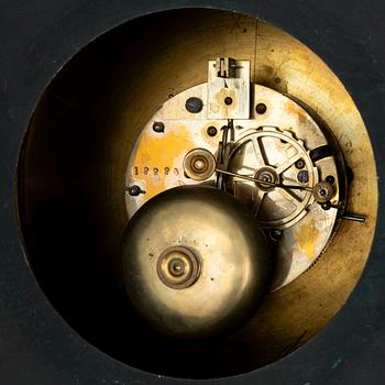 A Gustavian style wall clock, circa 1900.