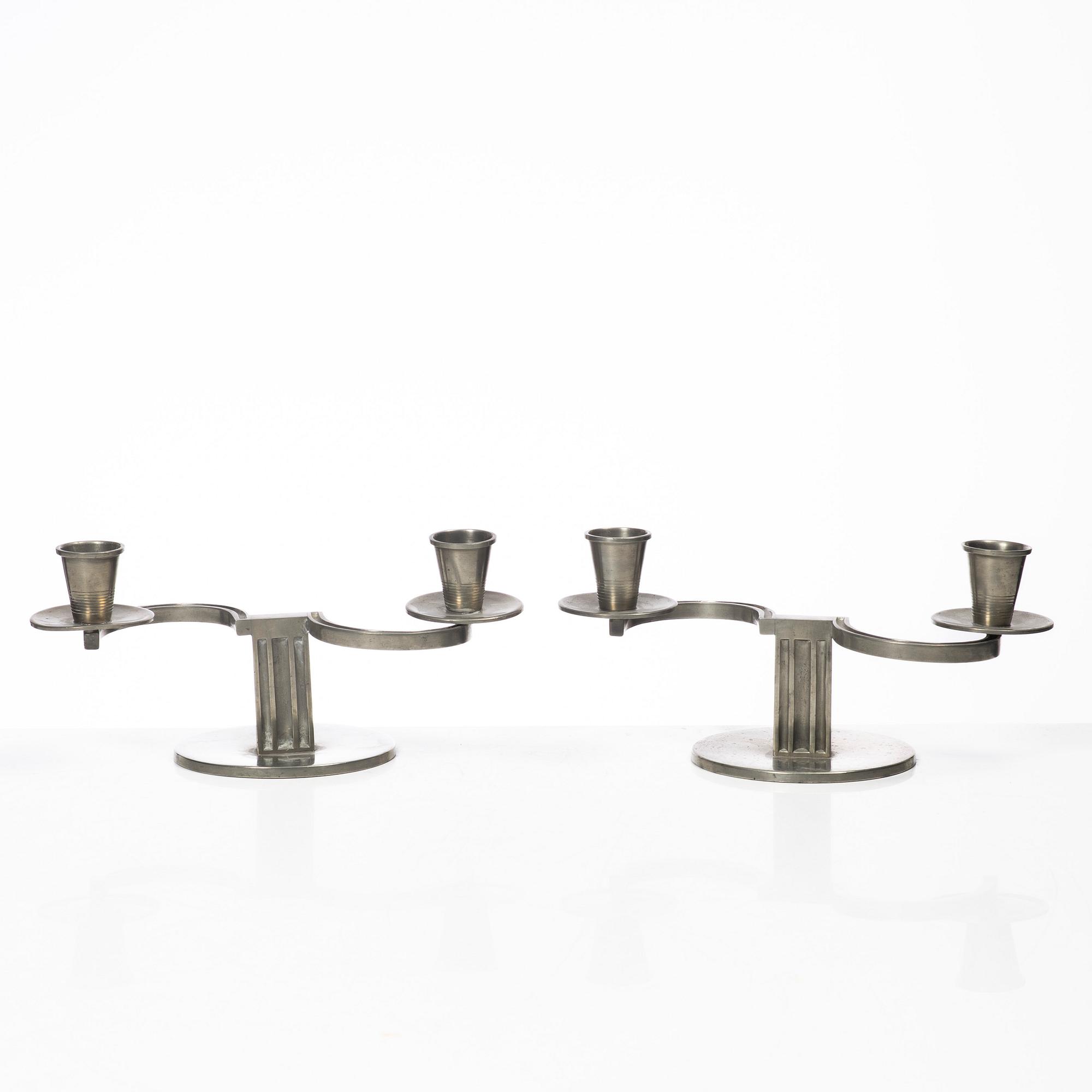 Nils Fougstedt, A pair of candelabra, FAK (Fabriksaktiebolaget Kronsilver), Stockholm, 1934.