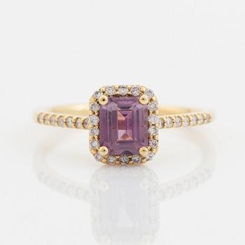 Emerald cut pink sapphire and brilliant cut diamond ring.