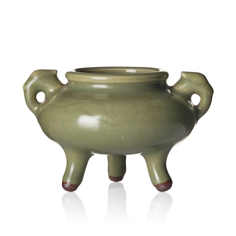 A celadon tripod brush-washer/censer, late Ming dynasty.