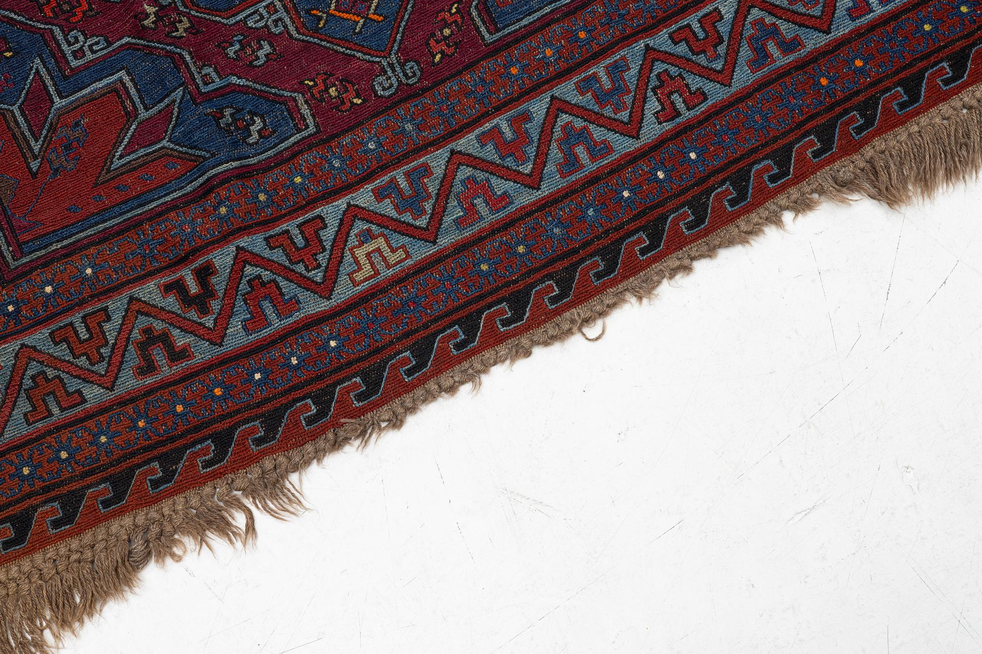 A semi-antique Sumak, probably Caucasian, c. 365 x 249 cm.