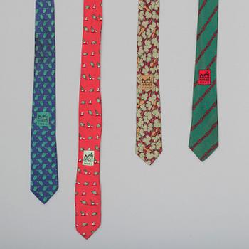 A set of four silk ties by Hermès.