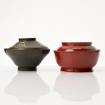A group of nine Japanese lacquer bowls with covers, Meiji and 20th century.