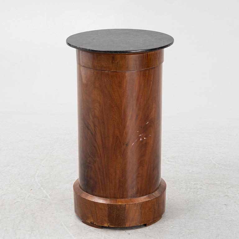 A mahogany veneered cabinet/bedside table with stone top, 19th Century.