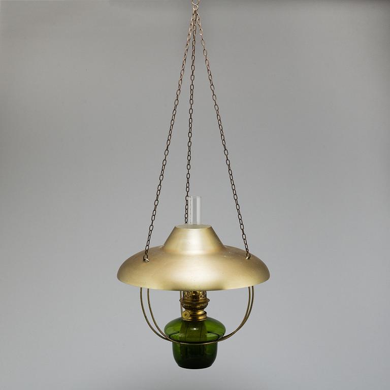 a paraffin ceiling light, brass and glass.