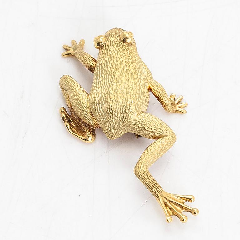 An 18K gold brooch, frog, signed Henry Dunay, New York.