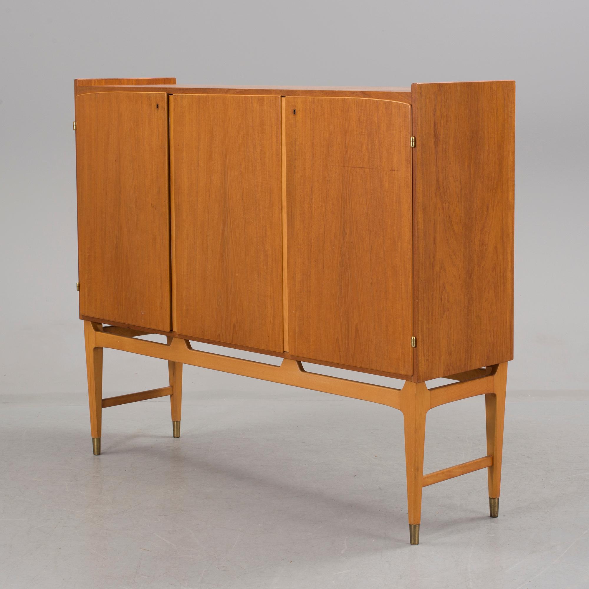 A teak veneer cabinet from Abrahamssons möbelfabrik, second half of the 20th Century.