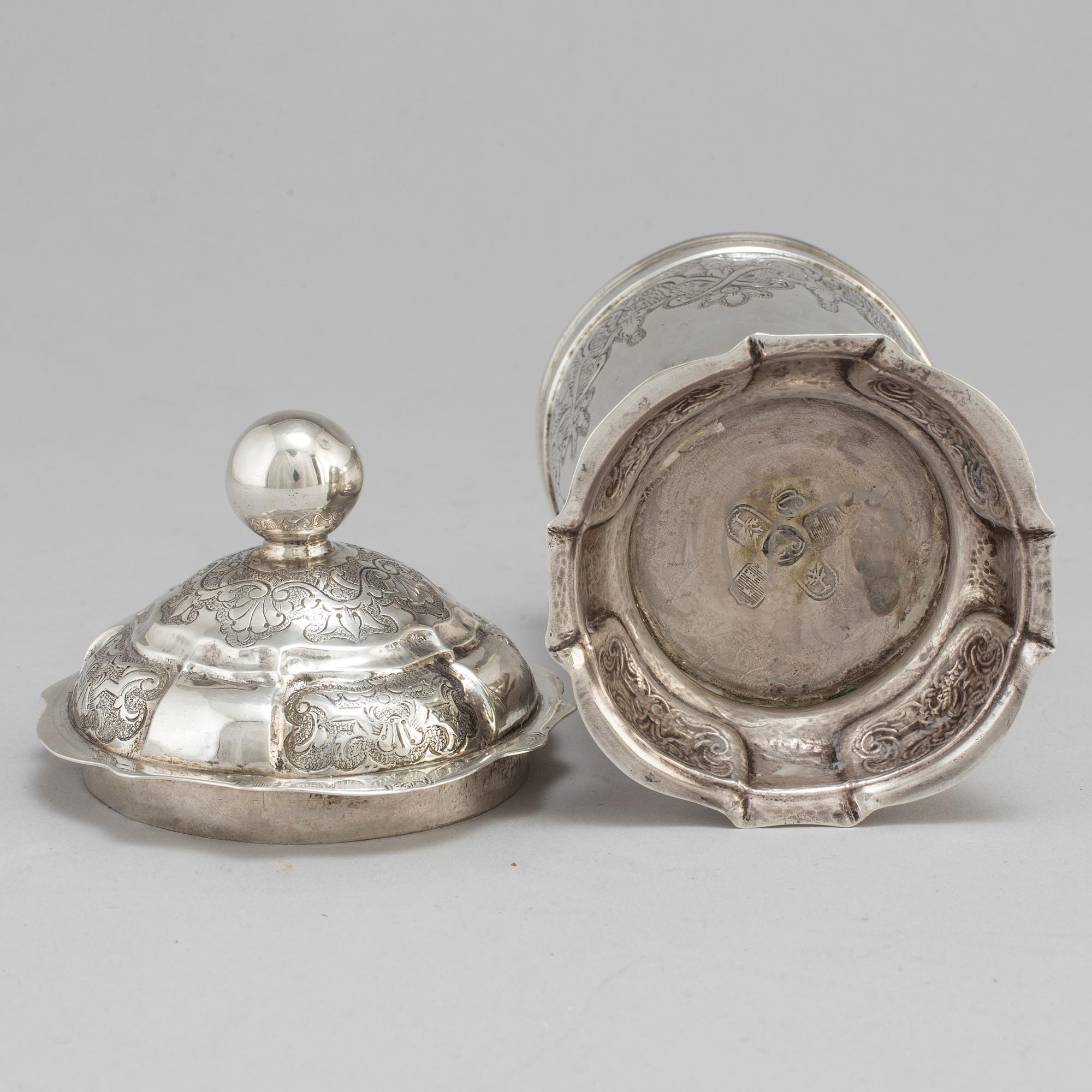 An 18th century silver beaker and cover, fantacy marks like Swedish pewter marks.