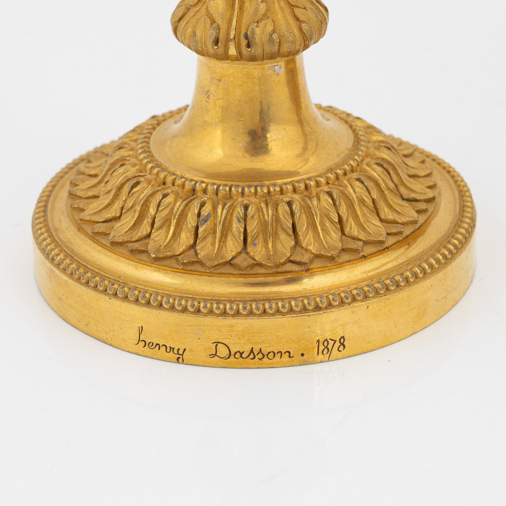 A pair of gilded bronze candelsticks, 19th Century.