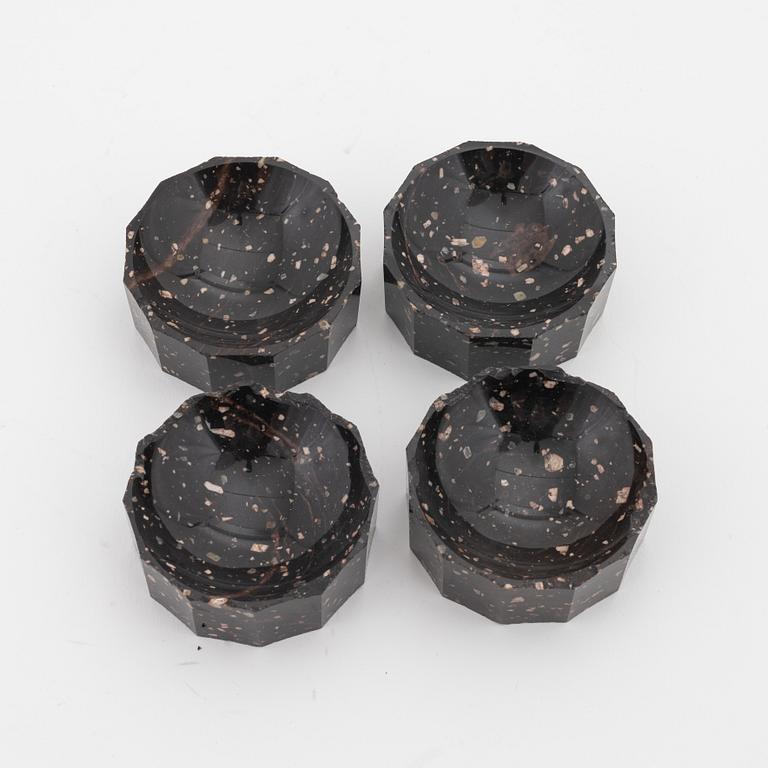 Four porphyry salt cellars, Empire, first half of the 19th cetnury.