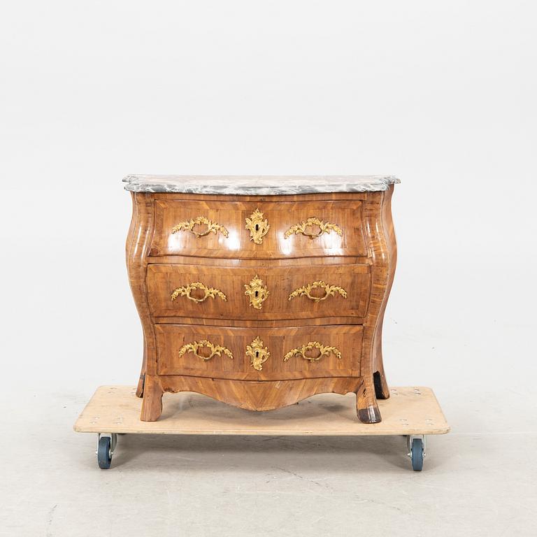 A mid 1700s Rococo dresser.