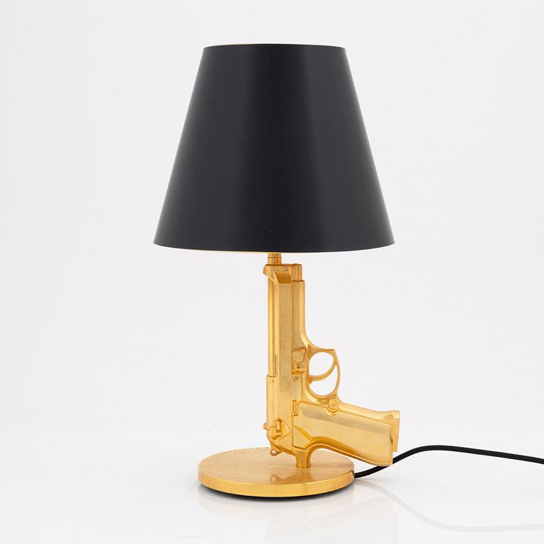 Philippe Starck, a 'Gun bedside Lamp' table light, Flos, Italy.