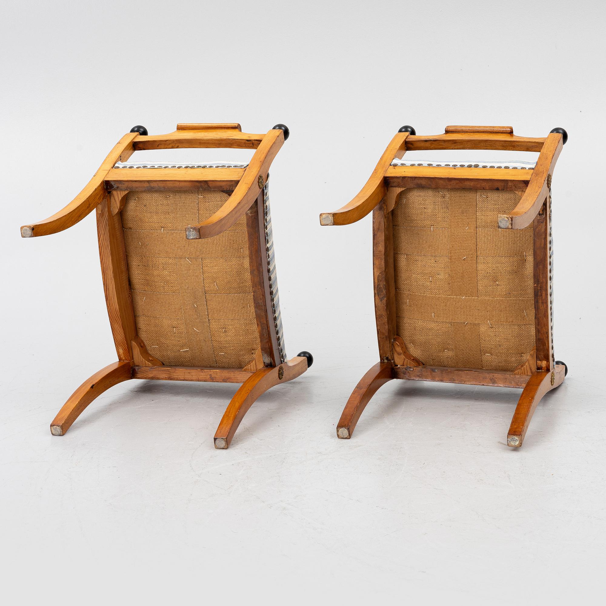 A pair of late Empire stools, mid-19th century.