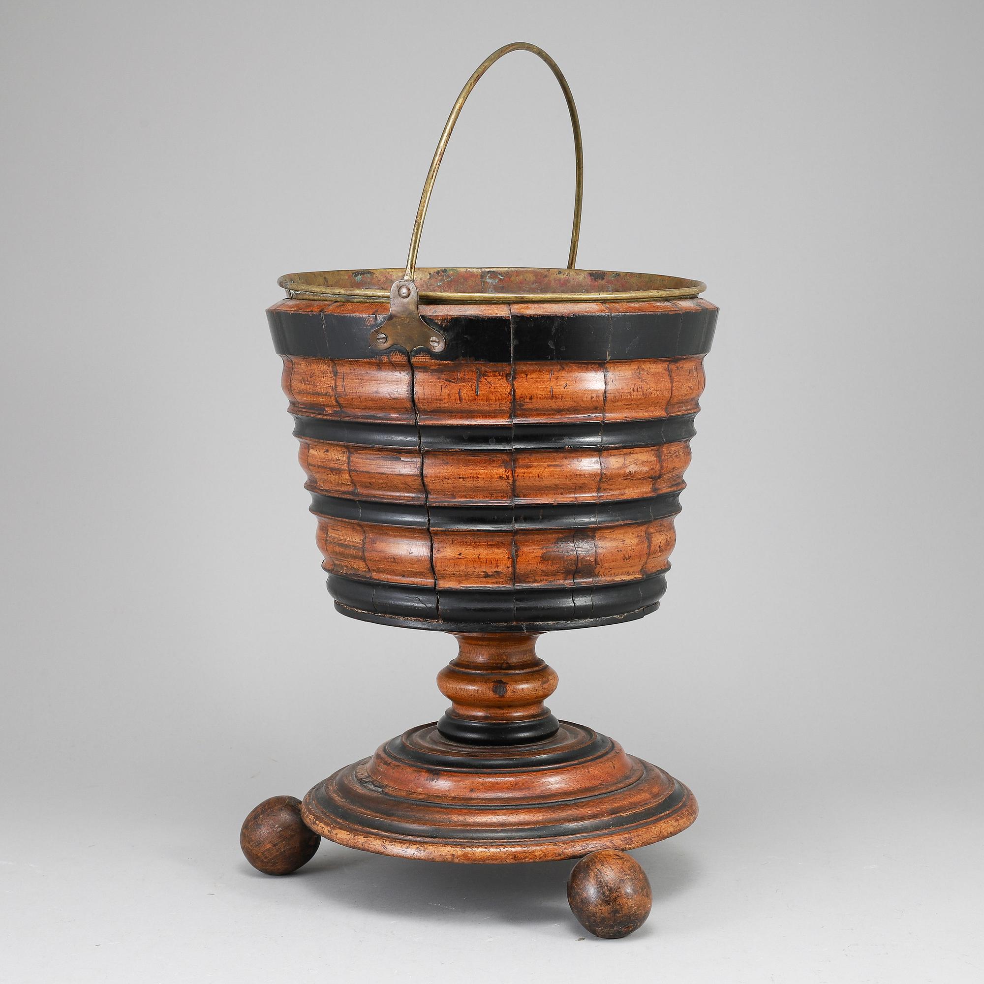 A 19th Century wooden champagne cooler.