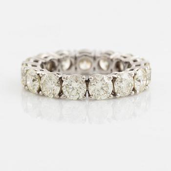 Brilliant cut diamond eternity ring.