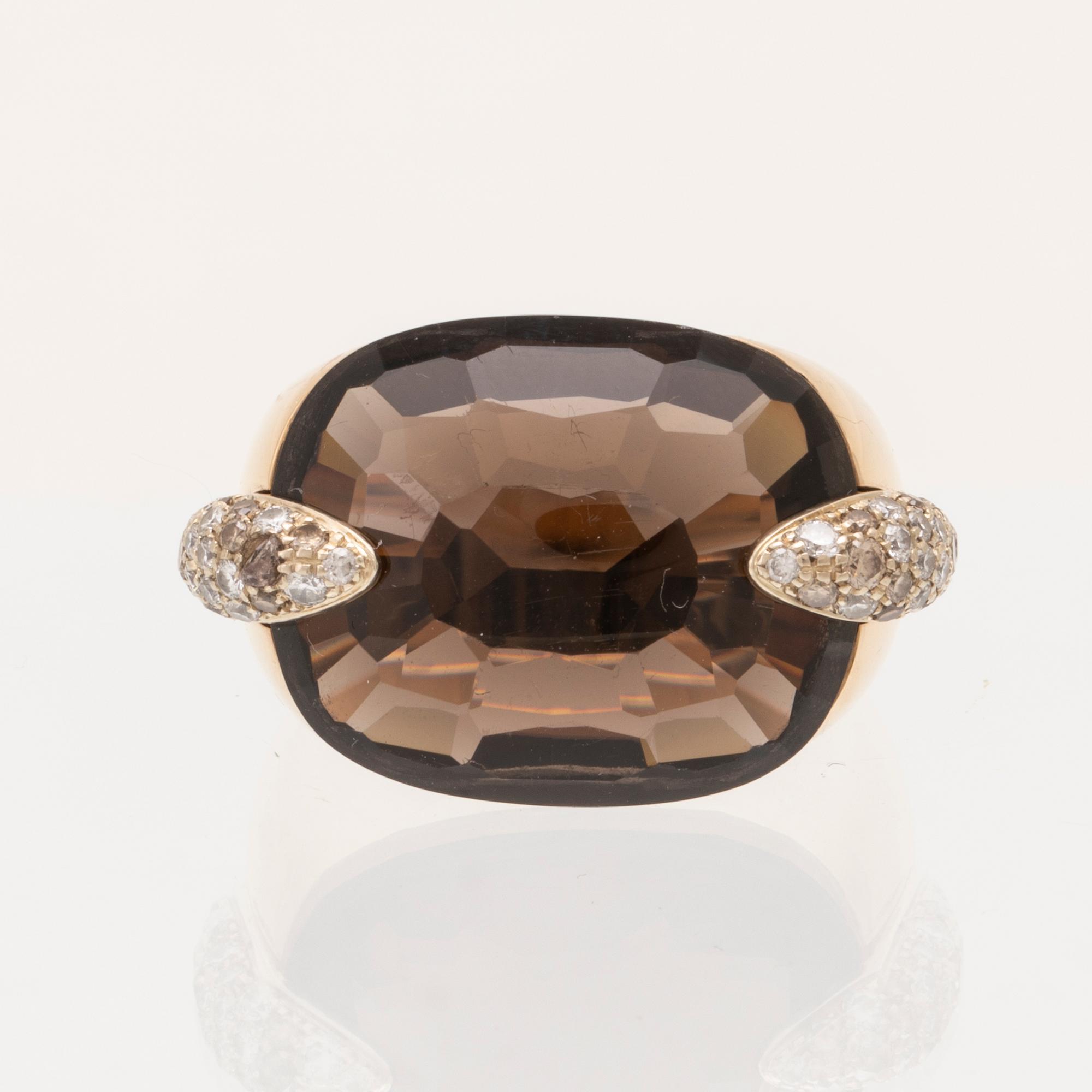 An 18K gold Pomellato "Pin Up" ring set with smoky quartz and round brilliant-cut diamonds.