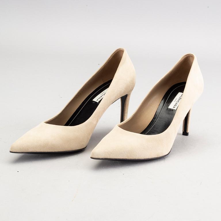 A pair of Balenciaga beige suede shoes size 38.