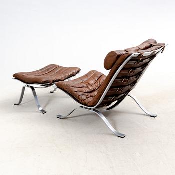 Arne Norell, a metal and leather Ari easy chair and foot stool after 1966.