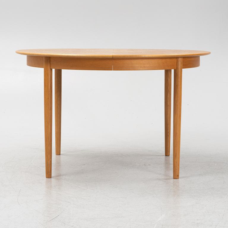 An oak dining table, second half of the 20th century.