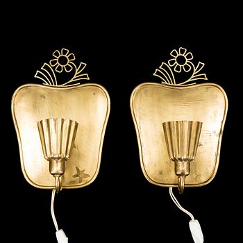 A pair of brass wall-lights by Firma Lars Holström, Arvika.