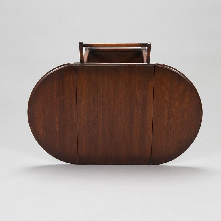 A drop-leaf tea trolley from the latter half of the 20th century.