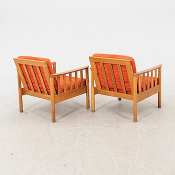 An oak easy chair ans sofa "Tiveden" by Gunnar Myrstrand & Sven Engström from the middle of the 20th century.