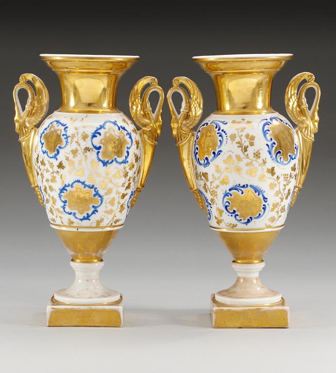 A pair of French Empire vases.