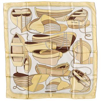 A set of three silk scarves by Hermès, "Etriers" and "Thalassa".
