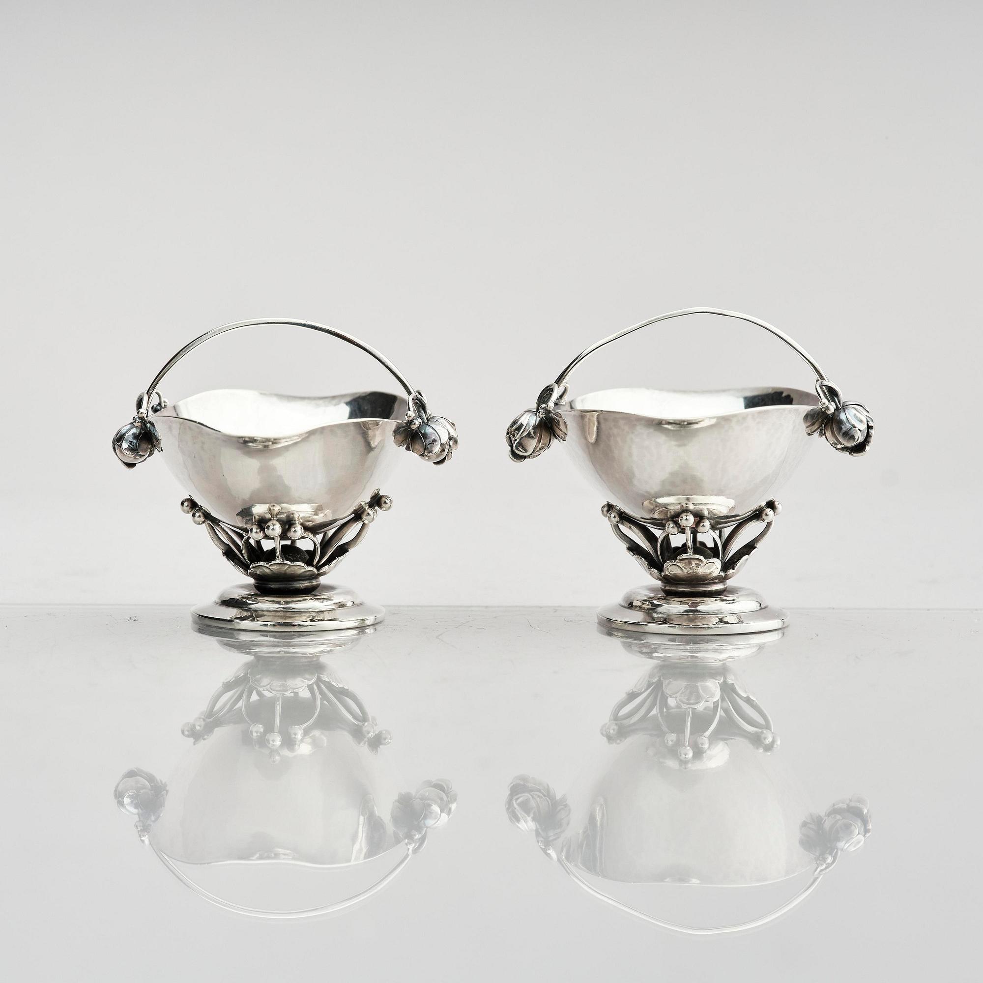 Georg Jensen, a pair of sterling silver sugar/spice jars, model no 235C, Copenhagen, Denmark 1925-1932.