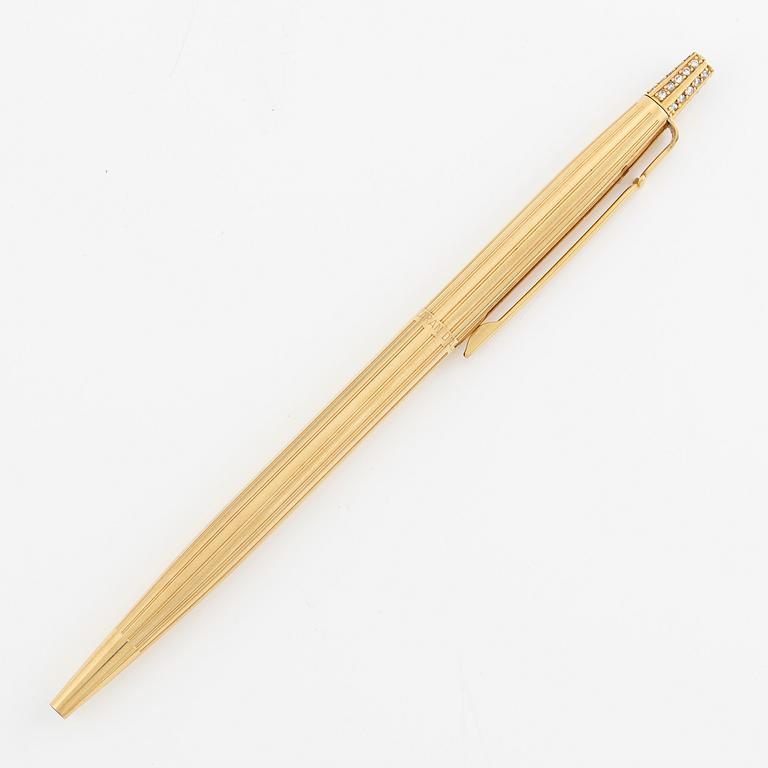 Caran d'Ache, pen, outer casing 18K gold with brilliant-cut diamonds.