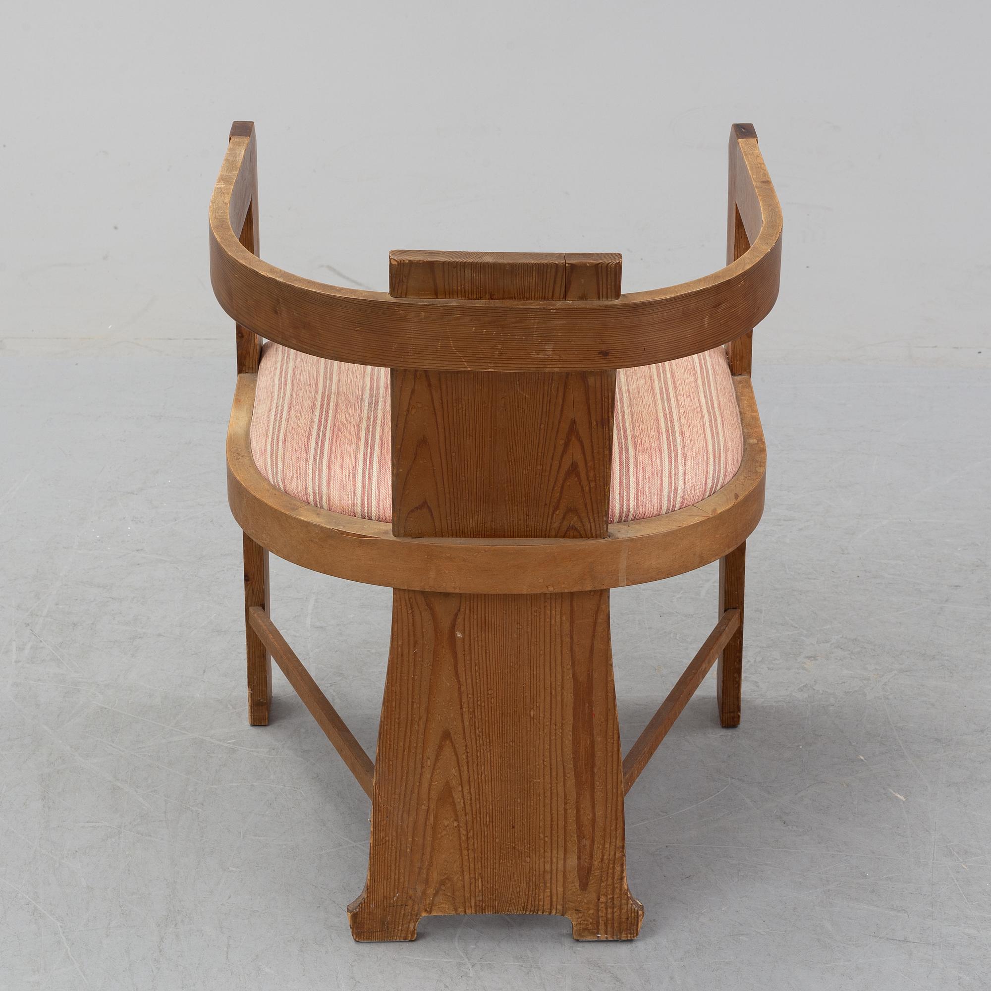 A pine armchair attributed to Carl Westman early 20th Century.