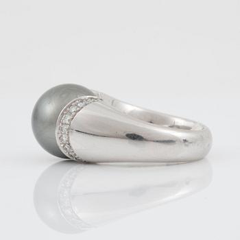 A cultured Tahiti pearl and diamond ring made by Gübelin.