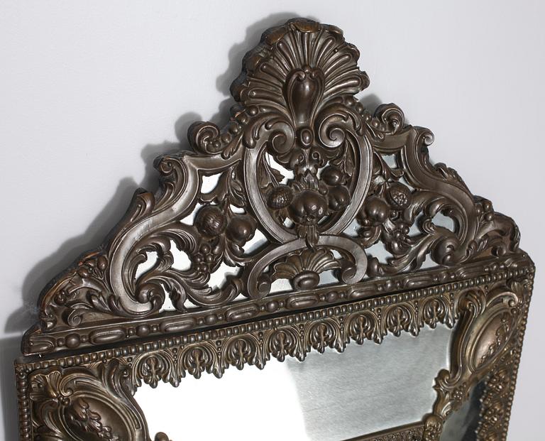 A baroque style mirror, late 19th century.