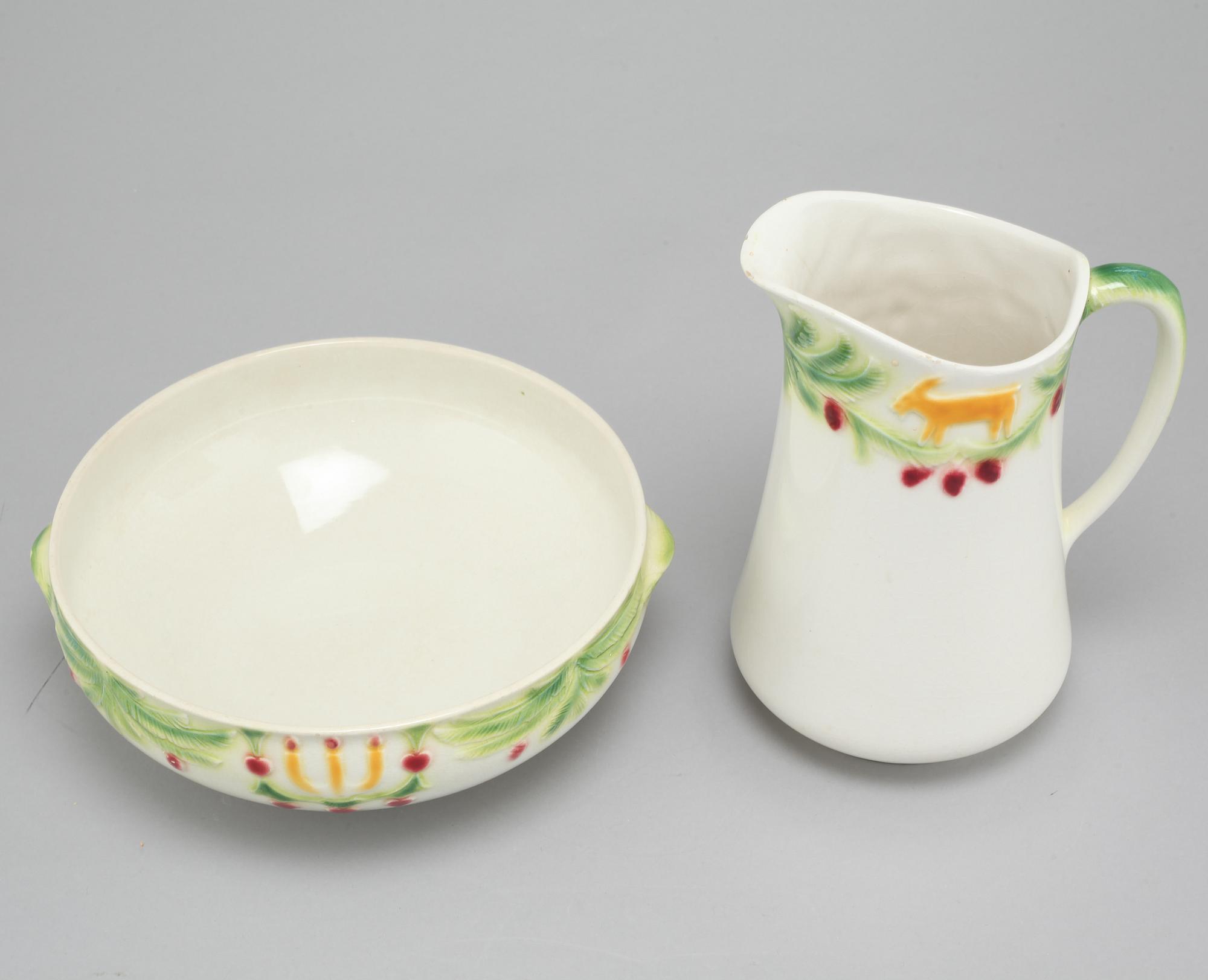 A jug and a bowl in earthenware by Rörstrand, second quarter of the 20th century.