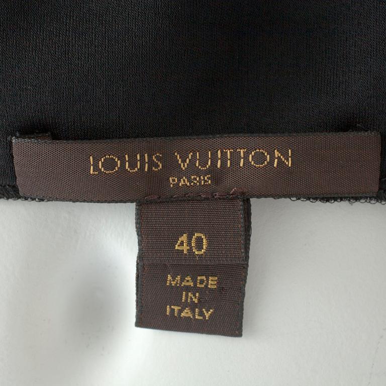 LOUIS VUITTON, a black silk mix dress.