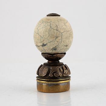 A Chinese hat finial / mandarin insignia, late Qing dynasty, 19th century.