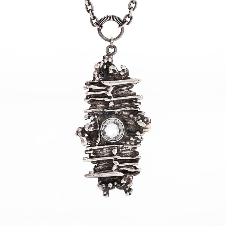 Pentti Sarpaneva, a silver and rock crystal necklace, ring and earrings, Turun Hopea, Turku.