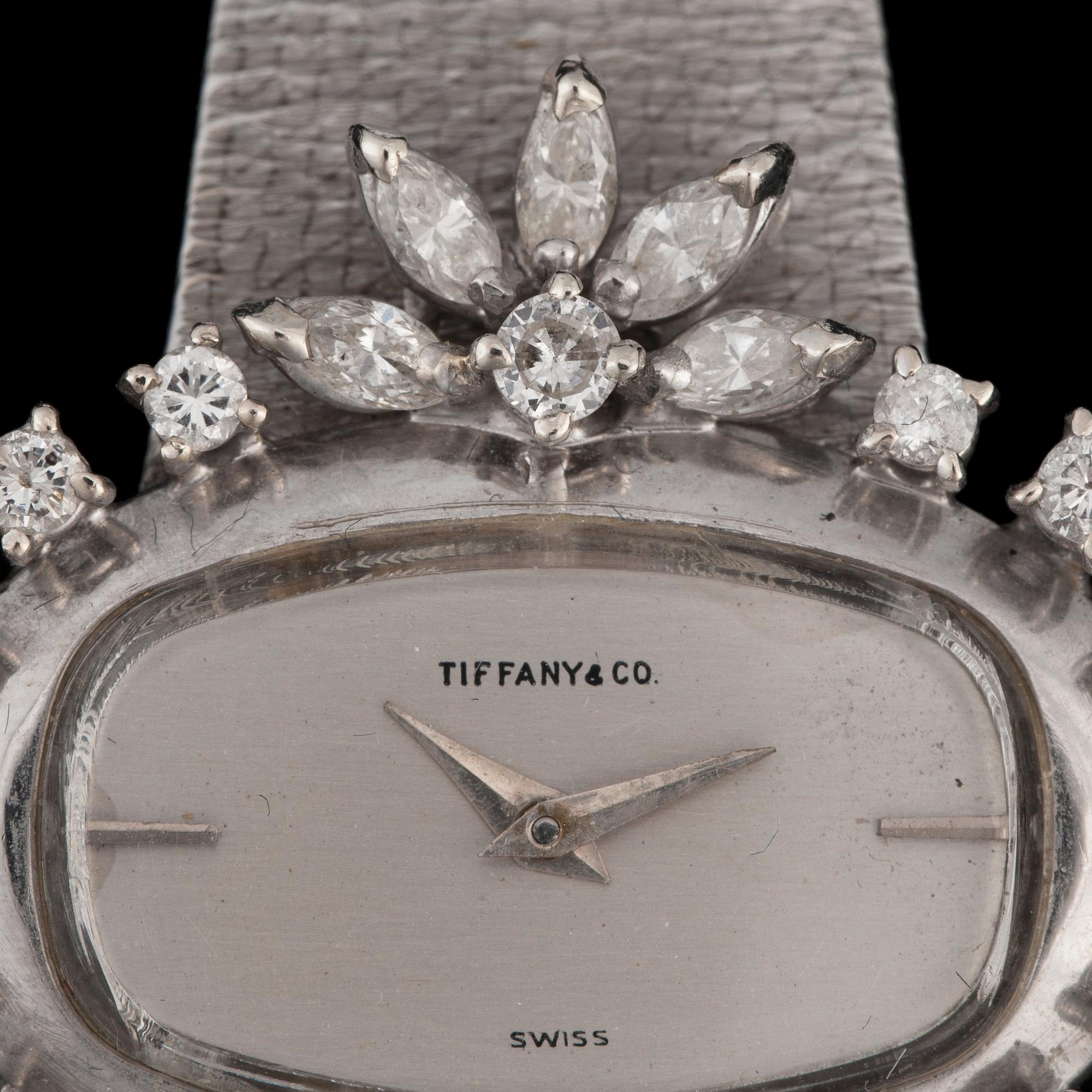 A Tiffany & co ladies wristwatch. Circa 1960- 70. Bezel set with brilliant- and navette-cut diamonds.