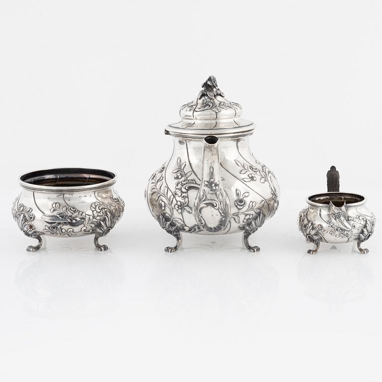 An Austro-Hungarian Silver Teapot, Creamer and Sugar Bowl, Vienna 1872-1922.