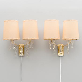 A pair of early 1950s '9413' wall lights for Taito, Finland.