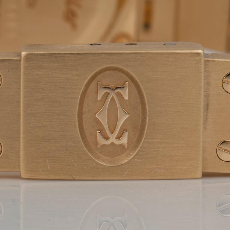 DAMUR, Cartier Santos, boett samt integrerad länk i 18K guld. Automat. Serienummer: 8090604461.