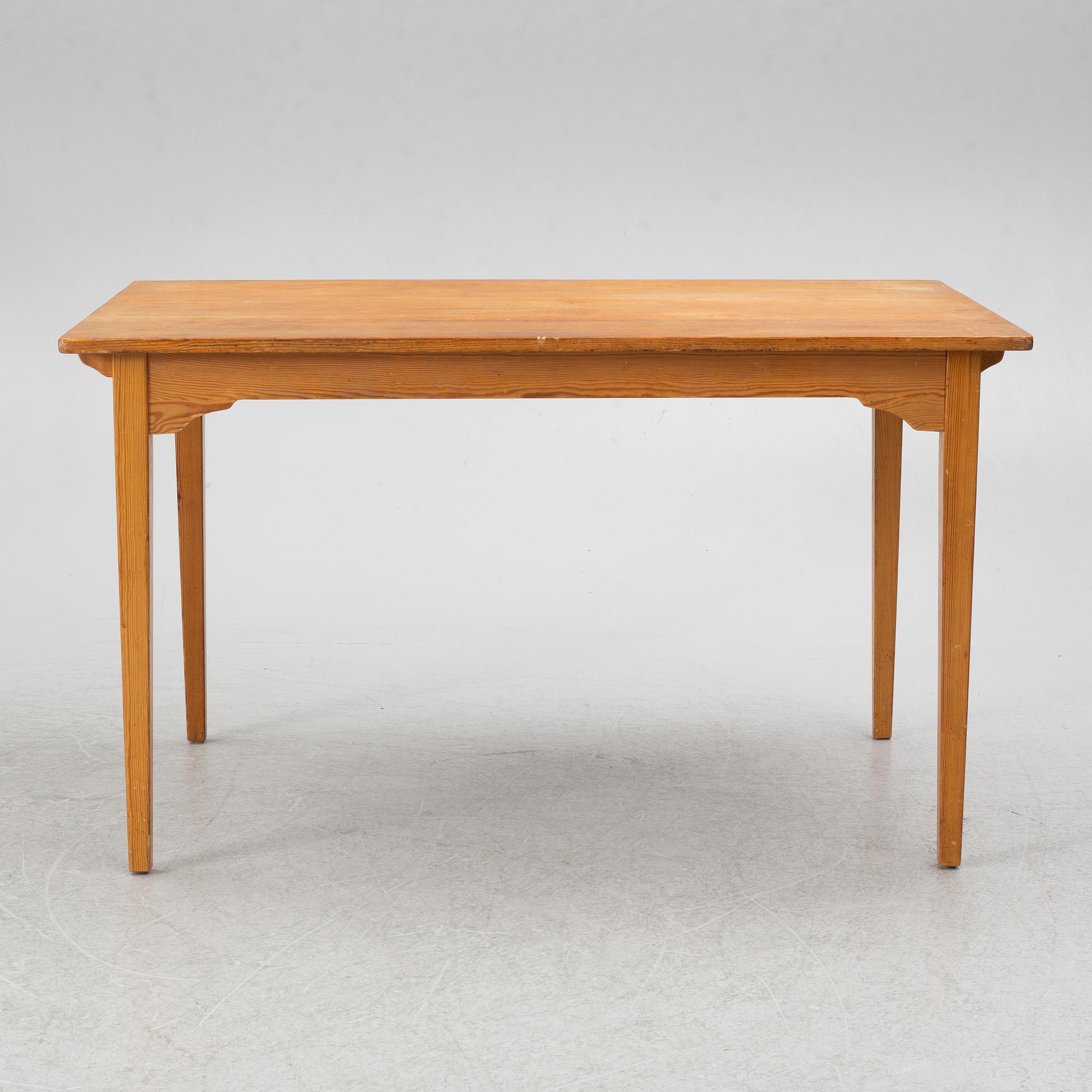 Carl Malmsten, dining table and four chairs, including Svensk Fur, second half of the 20th century.