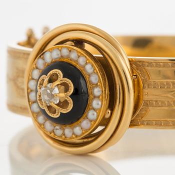 Möllenborg armring 18K guld med en gammalslipad diamant samt pärlor och svart emalj.