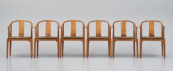 Hans J. Wegner, a set of 6 walnut 'China Chairs', Fritz Hansen, Denmark 1967.