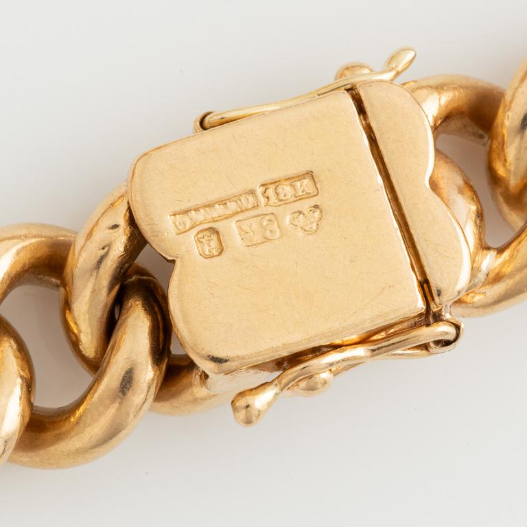 Armband, 18K guld med två stora berlocker.