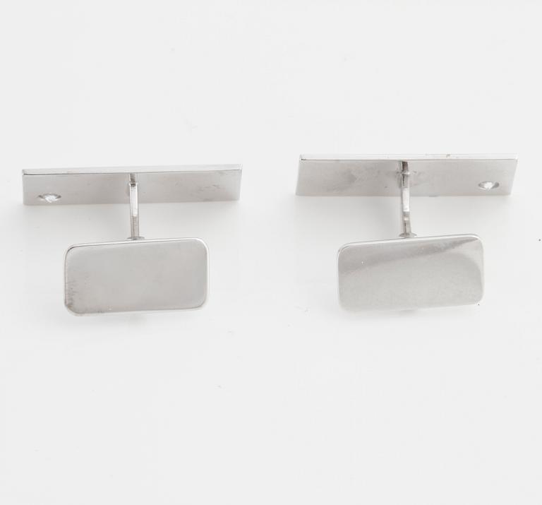 A pair of brilliant.cut cuff links made by goldsmith Gustav Dahlgren & Co.